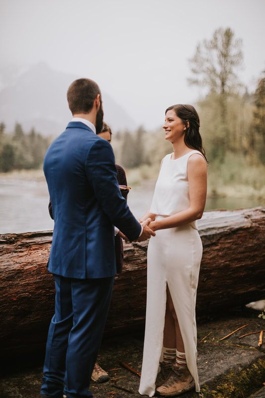 Bride's wedding details styled near the water at the PNW cabin