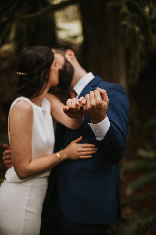 Bride's wedding details styled near the water at the PNW cabin