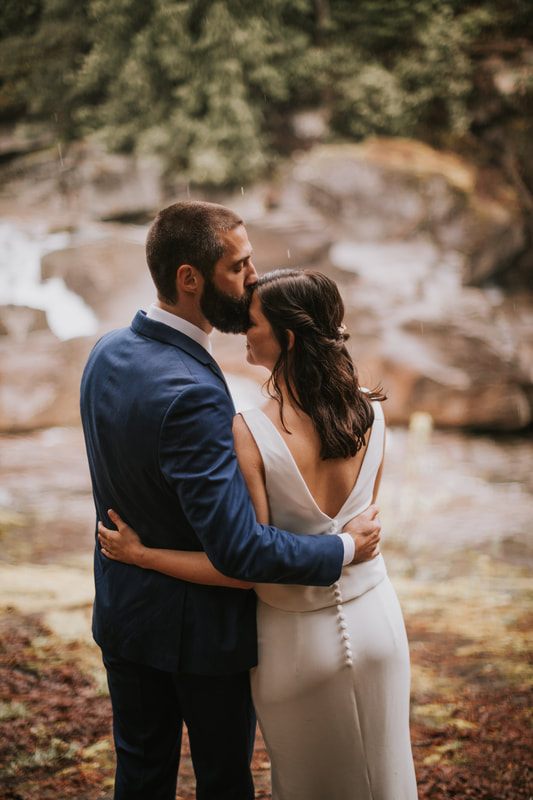 Couple sharing a quiet moment by the shot-ski table