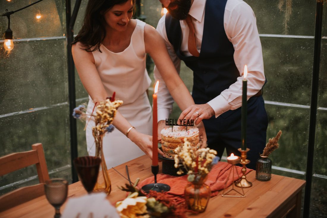 Elopement couple embracing near the mountains at That PNW Cabin