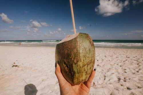 Tulum women's retreat group on the beach in Mexico