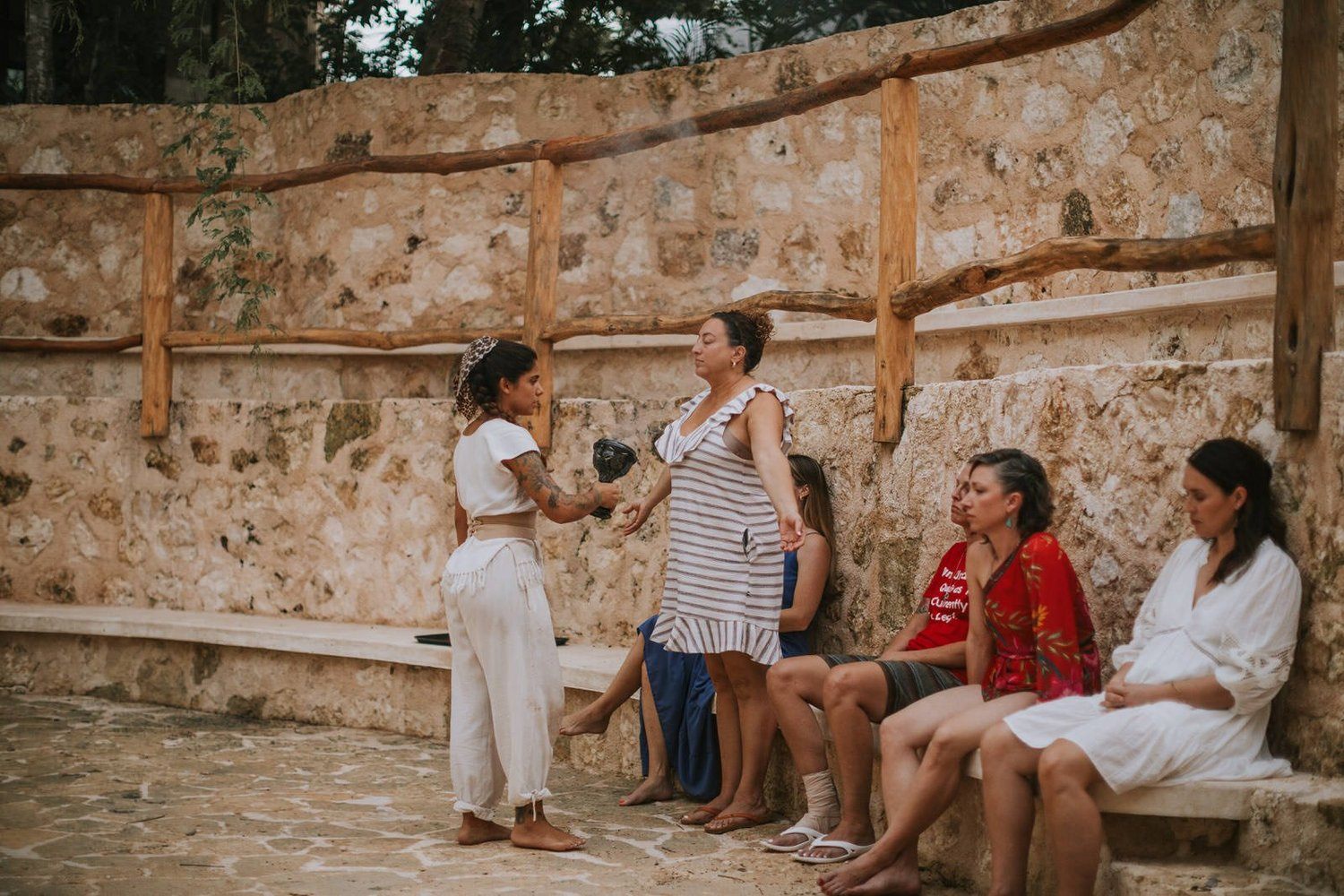 Women gathered at sunset on the Tulum women's retreat