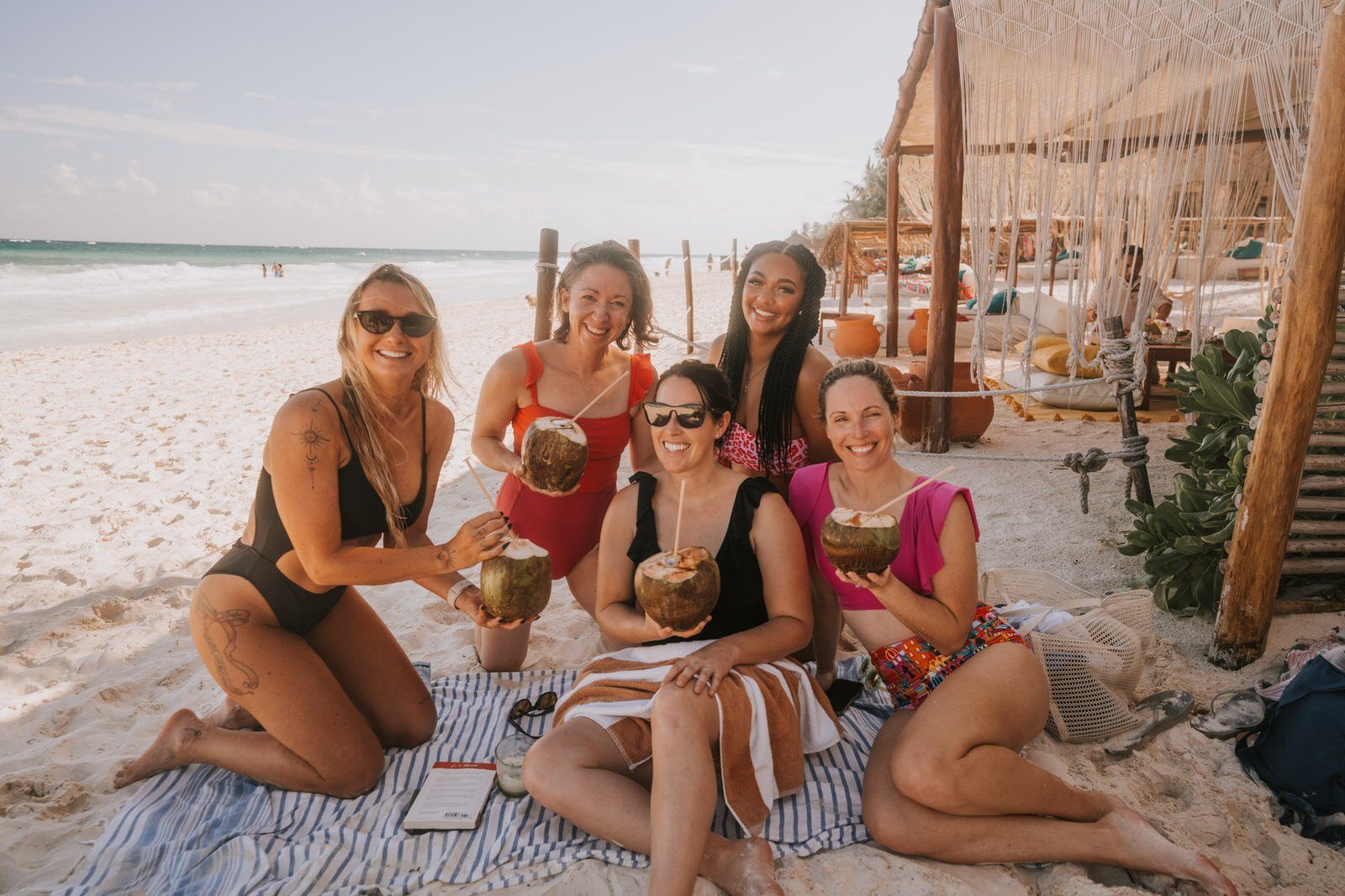 Women gathered at sunset on the Tulum women's retreat