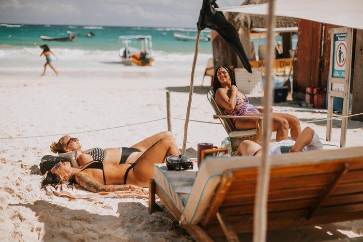 Jumping into the ocean in Tulum Mexico