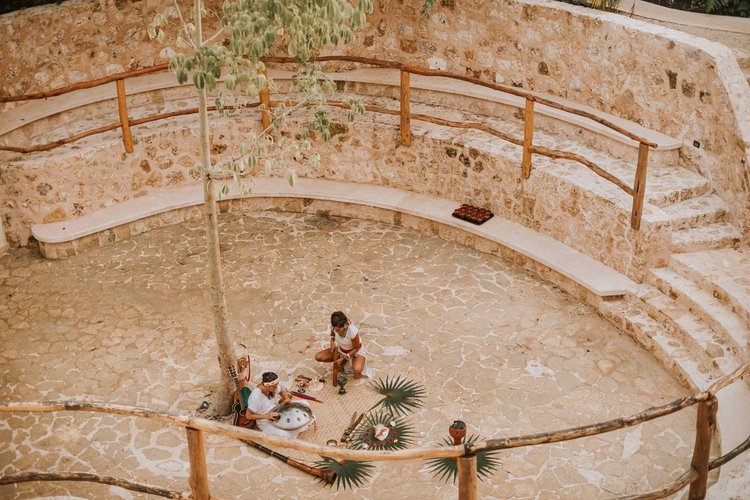 Women gathered at sunset on the Tulum women's retreat
