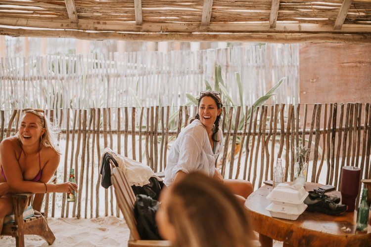 Tulum women's retreat group on the beach in Mexico