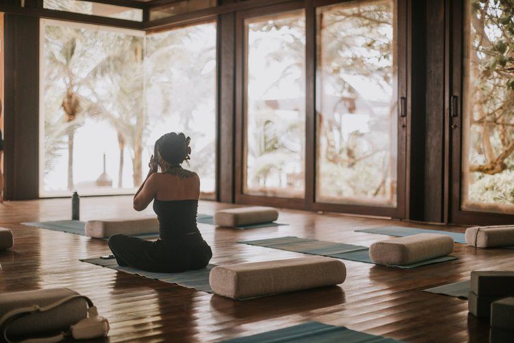 Women gathered at sunset on the Tulum women's retreat