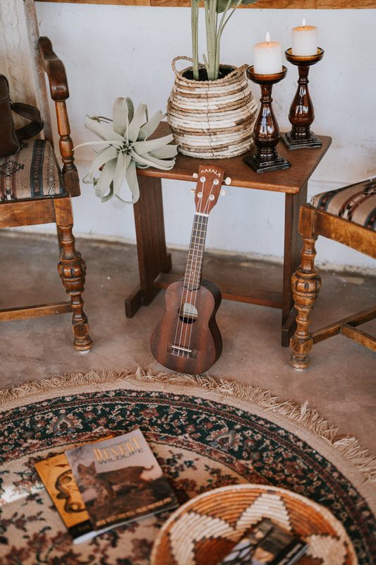 Close-up of studio tools and creative supplies at the desert property