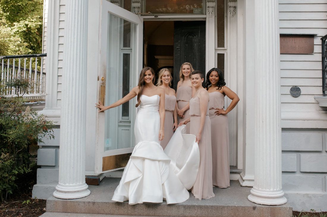 Bride getting ready with her bridesmaids before the Charleston wedding