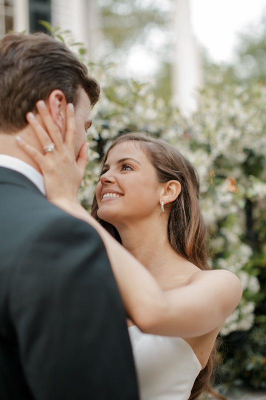 Guests celebrating and toasting the newlyweds in downtown Charleston