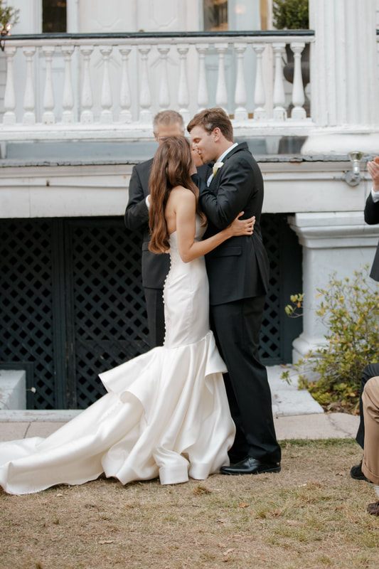 Bride and groom portrait on a historic Charleston street