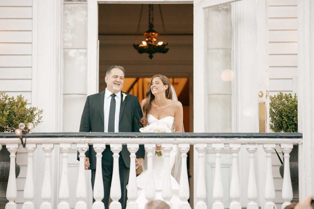 Detail shot of the wedding rings and bouquet at the Charleston venue