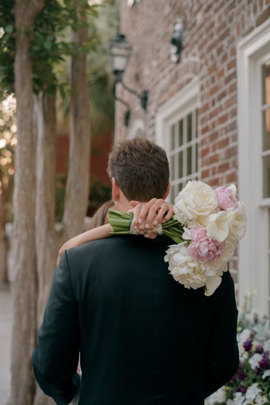 Bride and groom portrait on a historic Charleston street
