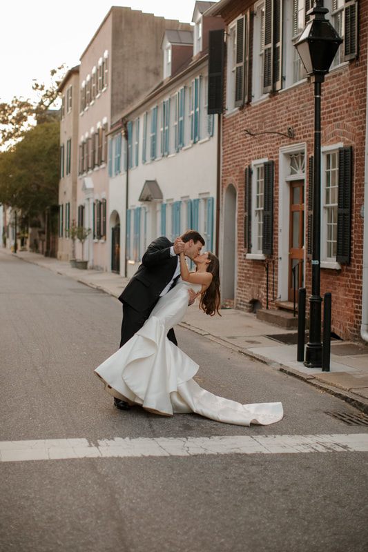 Close-up of the couple laughing together during their Charleston wedding