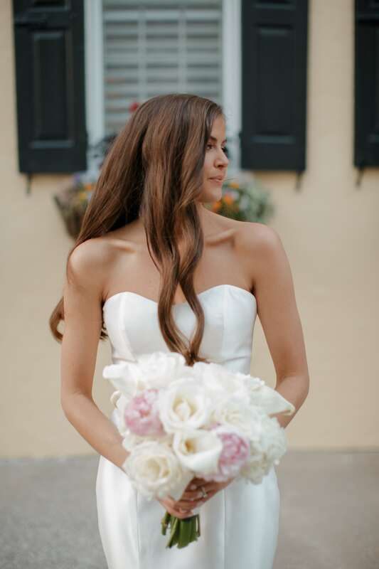 Close-up of the couple laughing together during their Charleston wedding