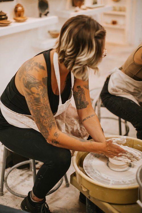 Women gathered at a downtown Asheville brewery after a hike