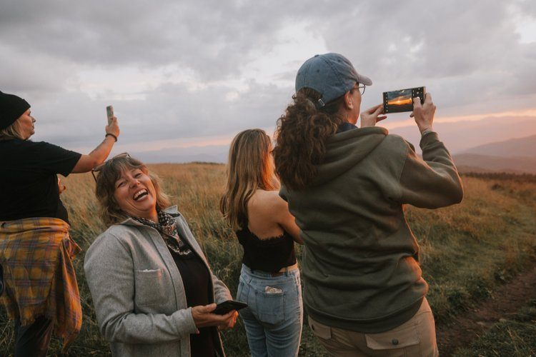 Sunset picnic at Max Patch on an Asheville women's retreat