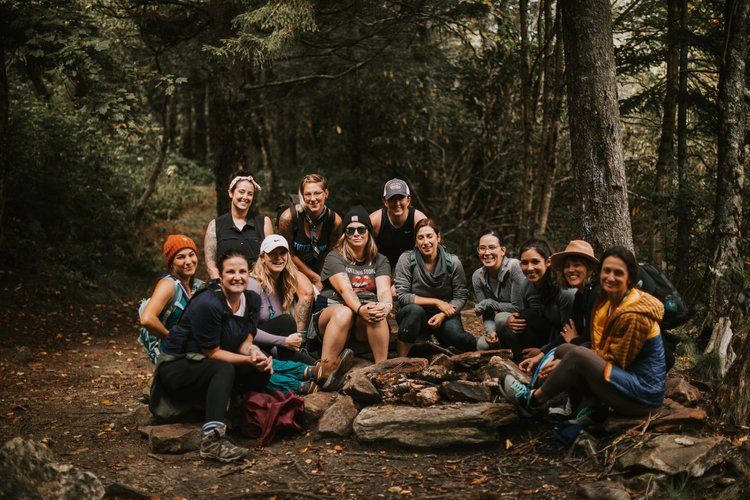 Sunset picnic at Max Patch on an Asheville women's retreat
