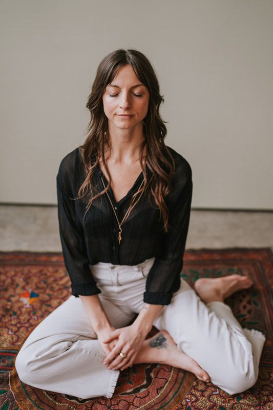 Celeste gestures expressively during her Seattle branding photography session.