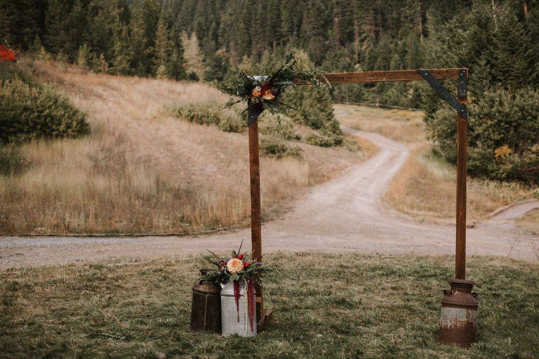 Couple sharing a first look moment atop the mountain at Snowbowl resort