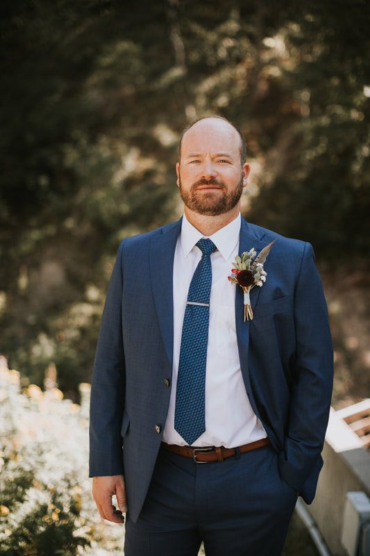 Wedding party portrait on the mountainside at Snowbowl ski resort