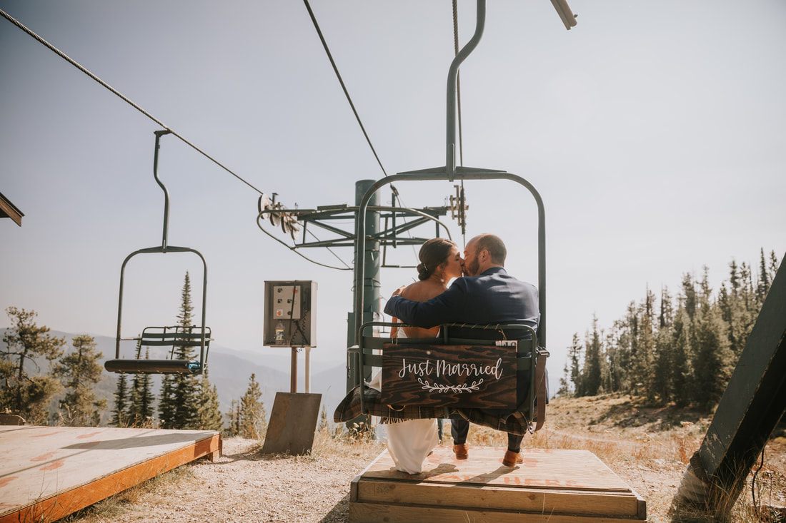 Groom portrait on the ski slopes during a summer wedding at Snowbowl