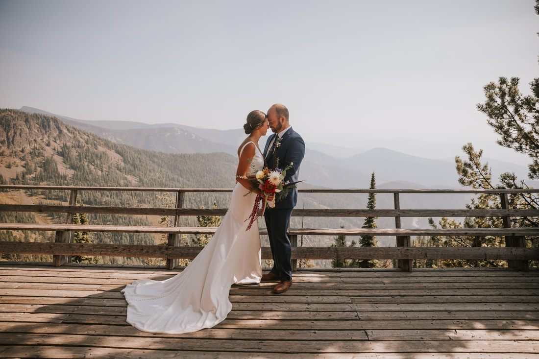 Candid portrait of the couple after their ceremony at Snowbowl