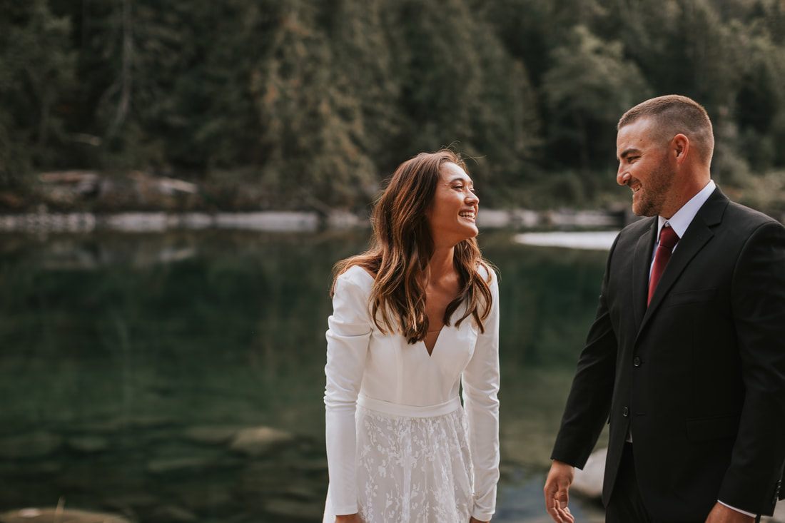 Krystal and Jeremy standing together on the cabin porch
