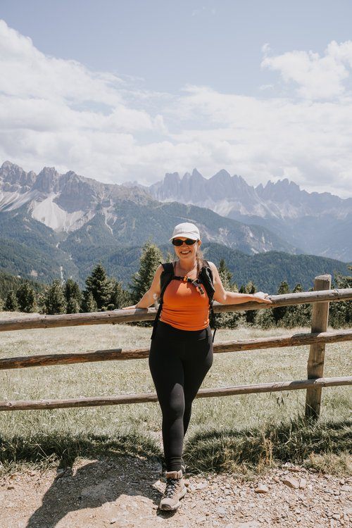 Women hiking a trail in the Italian Alps