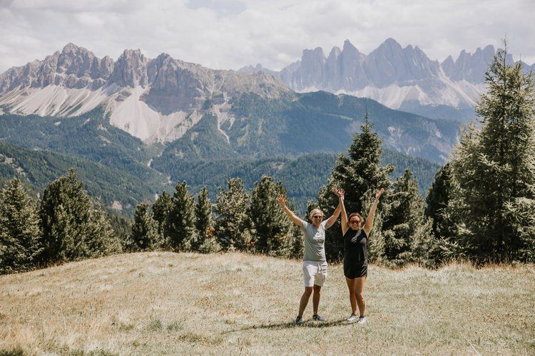 Group of women resting at a Dolomites hiking hut