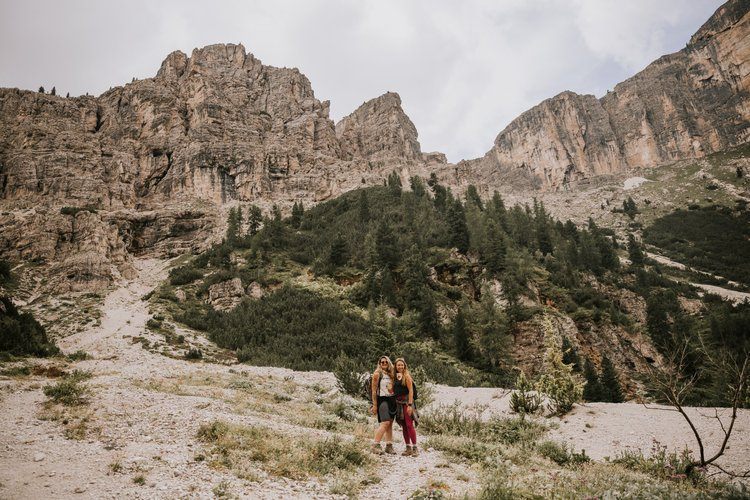 Jagged Dolomites peaks above a green valley