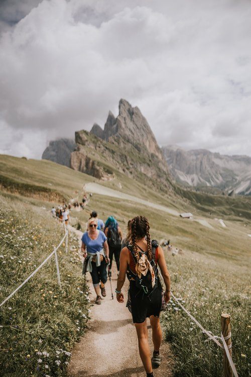 Dolomites women's retreat group hiking the Seceda ridgeline