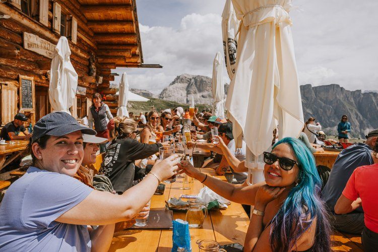 Mountain hut with beer and cheese on a Dolomites women's retreat