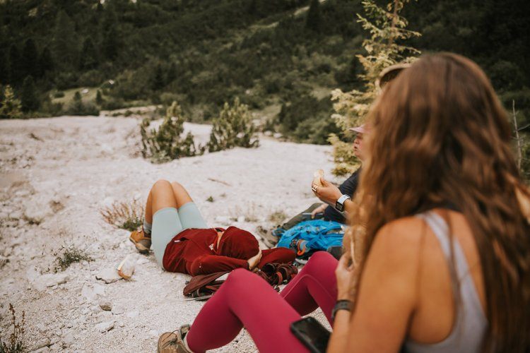 Women hiking a trail in the Italian Alps