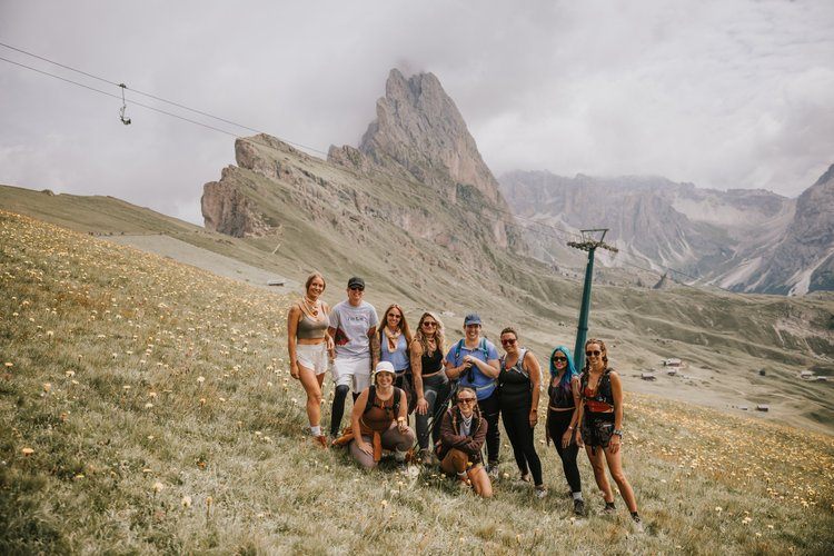 Dolomites women's retreat group hiking the Seceda ridgeline