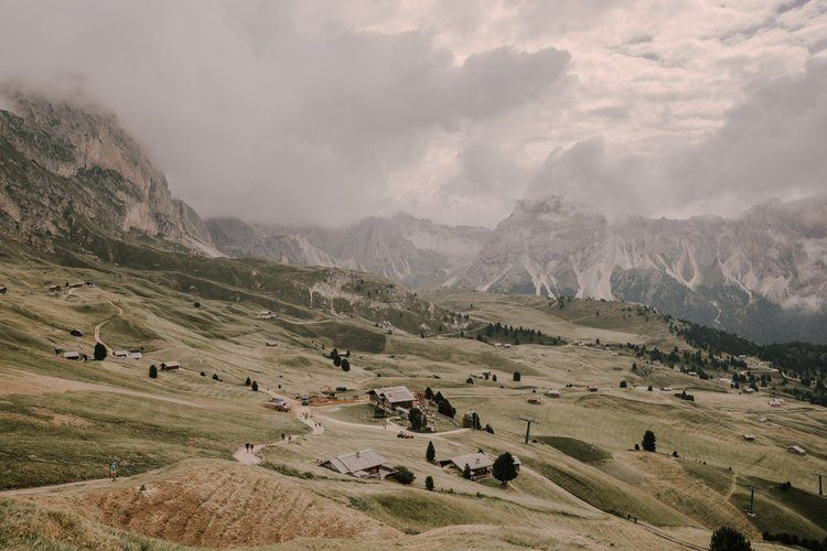 Group of women resting at a Dolomites hiking hut