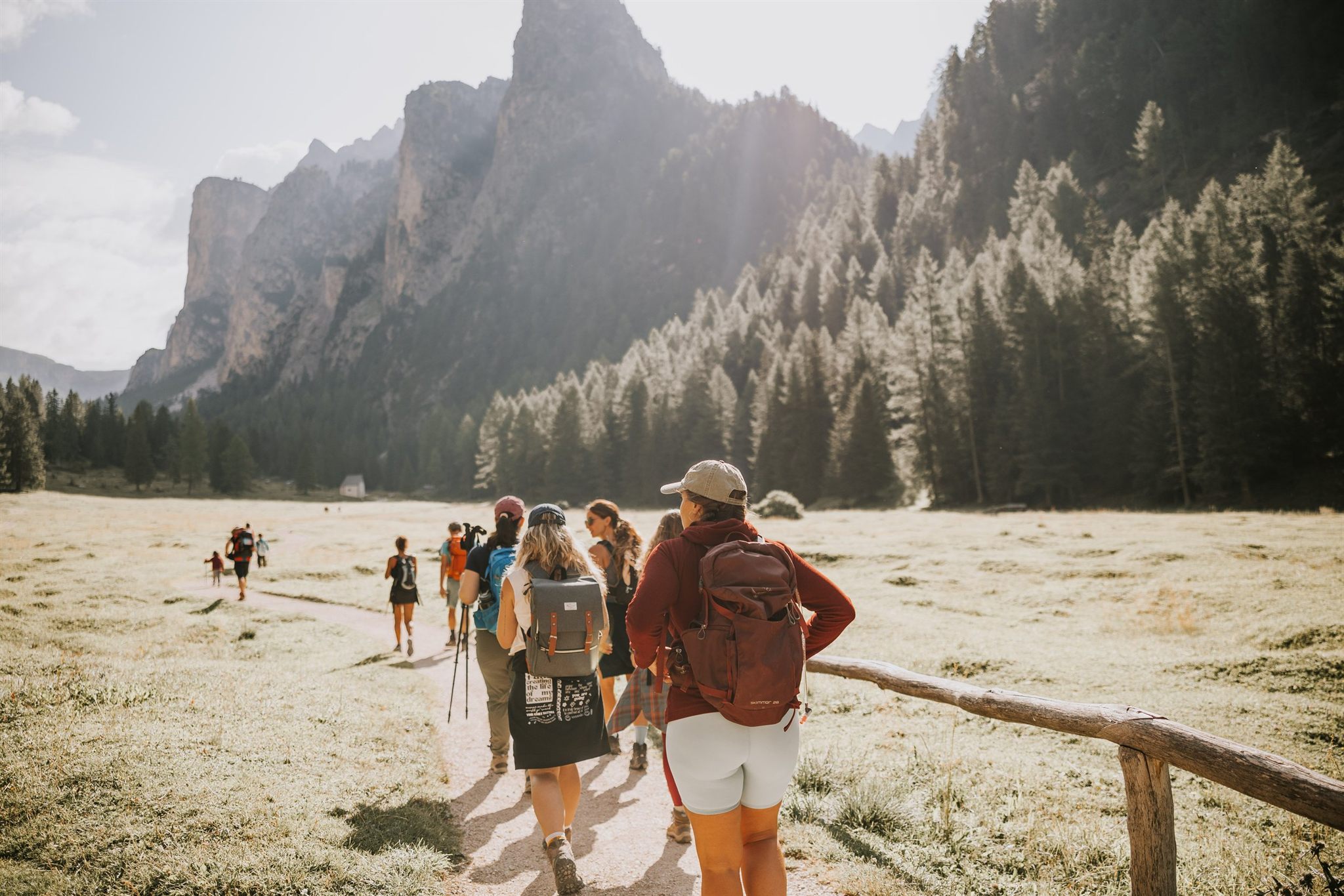 Women hiking a trail in the Italian Alps