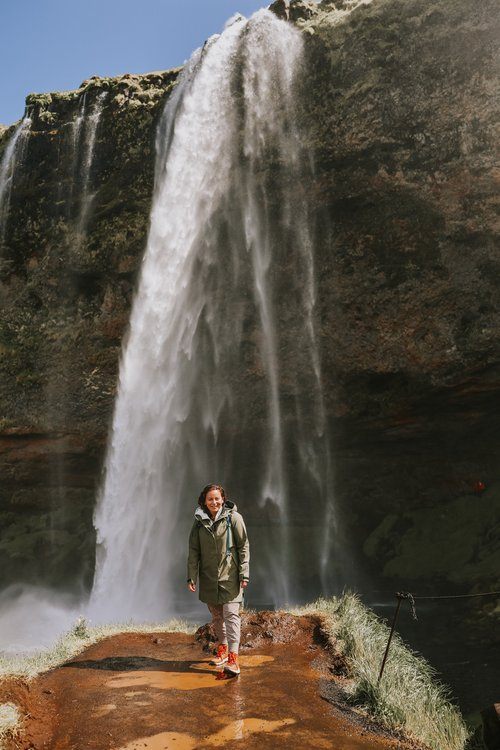 Iceland women's retreat group at a waterfall
