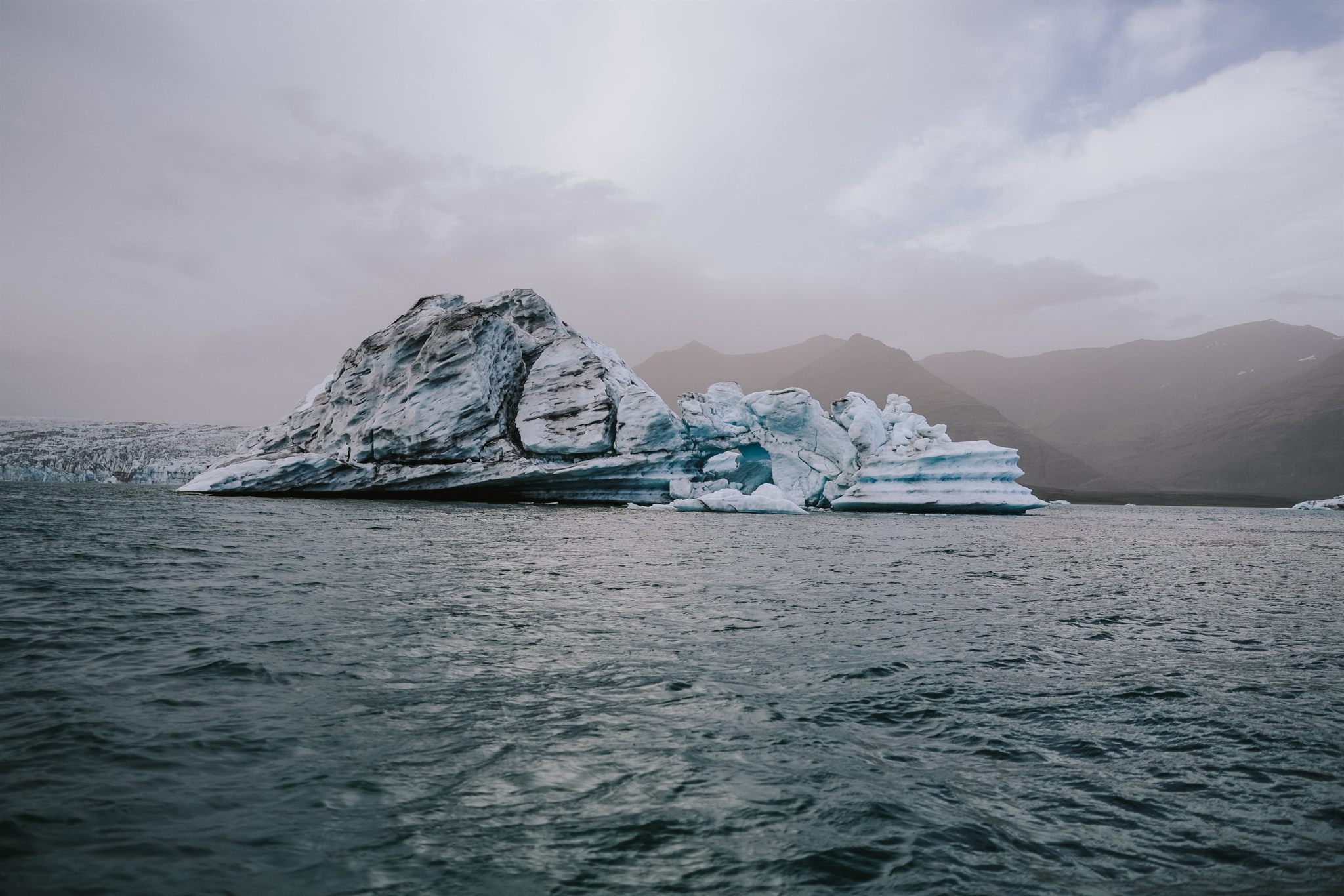 Glacier lagoon with drifting blue ice in Iceland