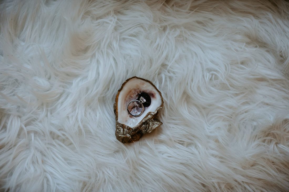 Close-up of Nicole's engagement ring at their Charleston-area treehouse engagement