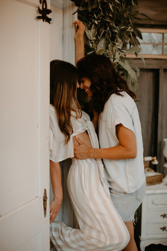 Candid photo of the couple laughing during their South Carolina engagement session