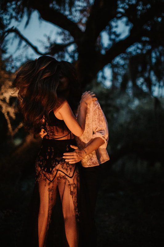 Francesca and Nicole cuddled up together inside the cozy treehouse