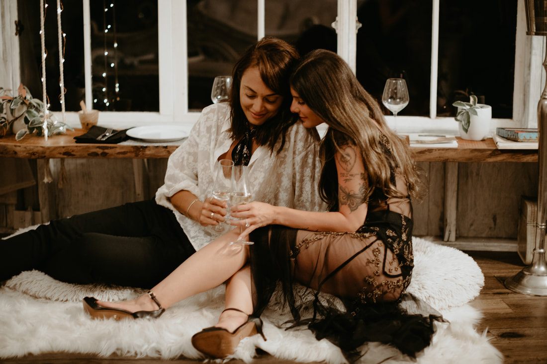 Candid photo of the couple laughing during their South Carolina engagement session