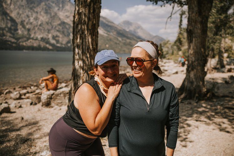 Campfire gathering at the Grand Tetons women's retreat