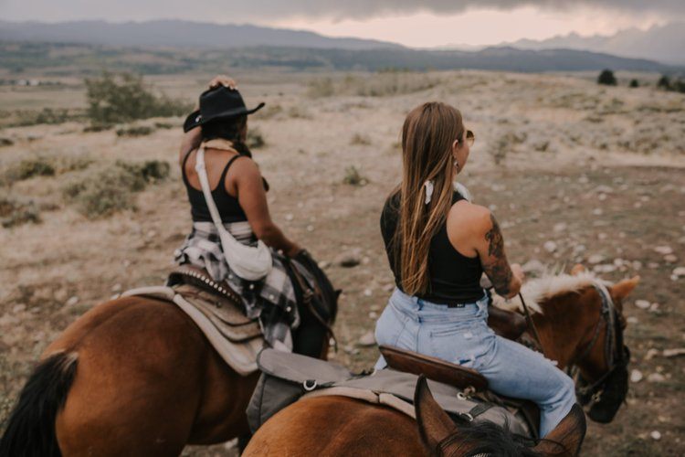 Women gathered outdoors at the Grand Tetons retreat