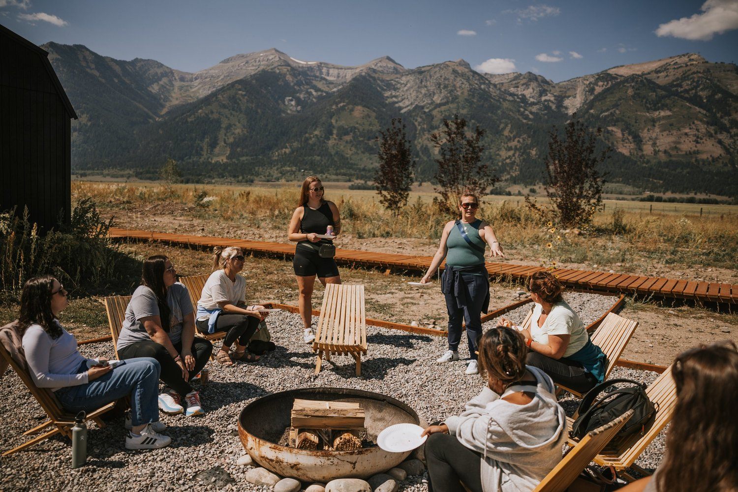 Campfire gathering at the Grand Tetons women's retreat