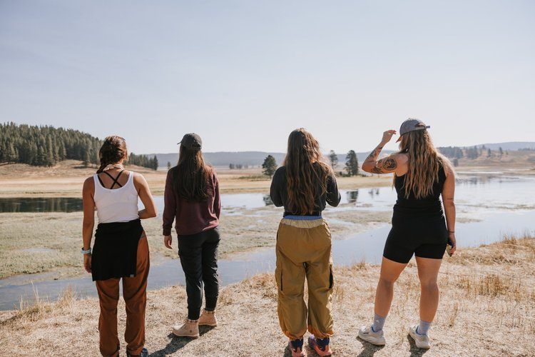Women gathered outdoors at the Grand Tetons retreat