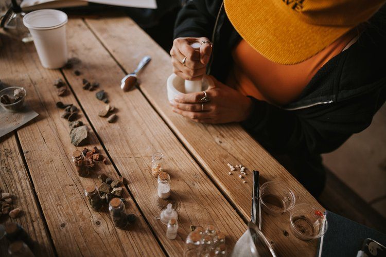 Making pigment from earth and rocks on a Santa Fe women's retreat