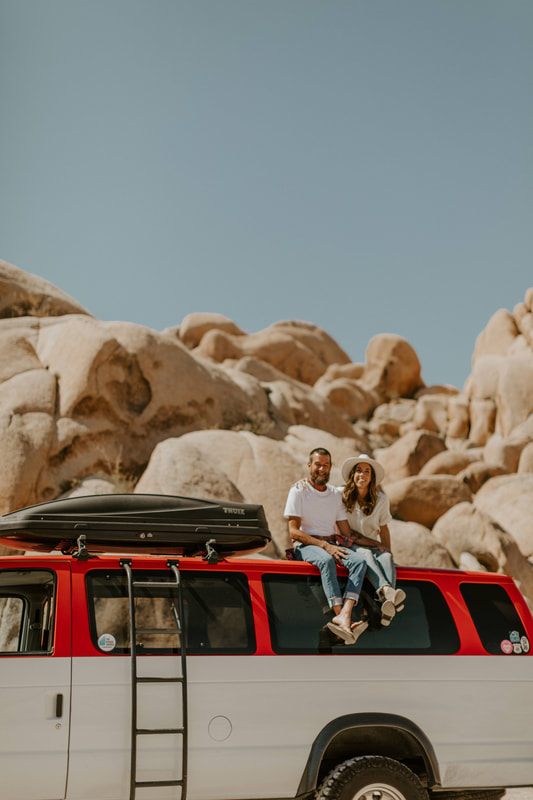 Wide shot of the dramatic desert scenery surrounding the engagement session