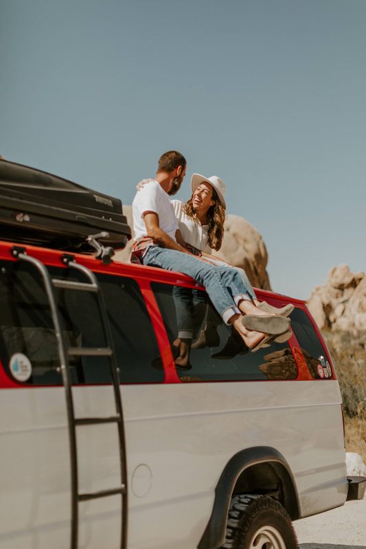 The couple sharing a quiet moment beside a Joshua tree, from later in the session